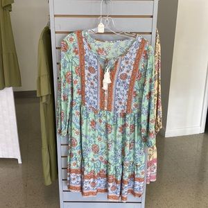 Medium floral dress soft material. Brand new. No brand.